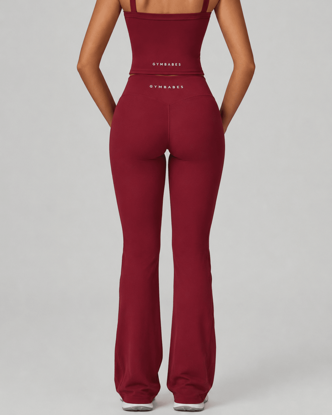 Sculpt Lift flare legging in Burgundy, detailfoto van de v-vormige tailleband